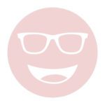 Circular icon with a smiling face wearing glasses, representing the FL-41 Indoor lens tint.