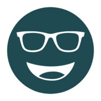 Circular icon with a smiling face wearing glasses in teal, representing the Noir-23 lens tint.