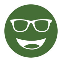 Circular icon with a smiling face wearing glasses in forest green, representing the Noir #30 lens tint.