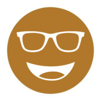 Circular icon with a smiling face wearing glasses in golden brown, representing the Noir-44 lens tint.