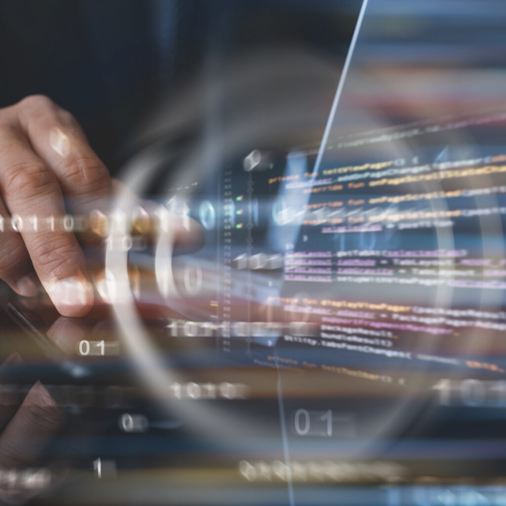 Business and modern technology background, Computer software development with augmented reality AR, Business man, programmer working on laptop computer, smart phone with code, binary on virtual screen