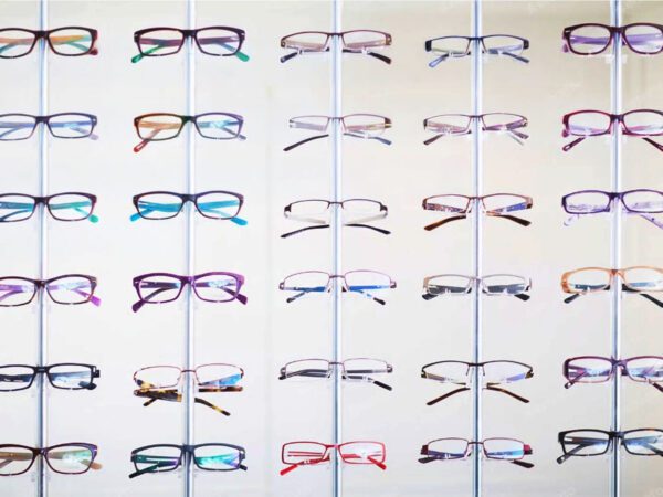 Colorful display of eyeglass frames—helping clients find their style and improve vision with custom solutions.