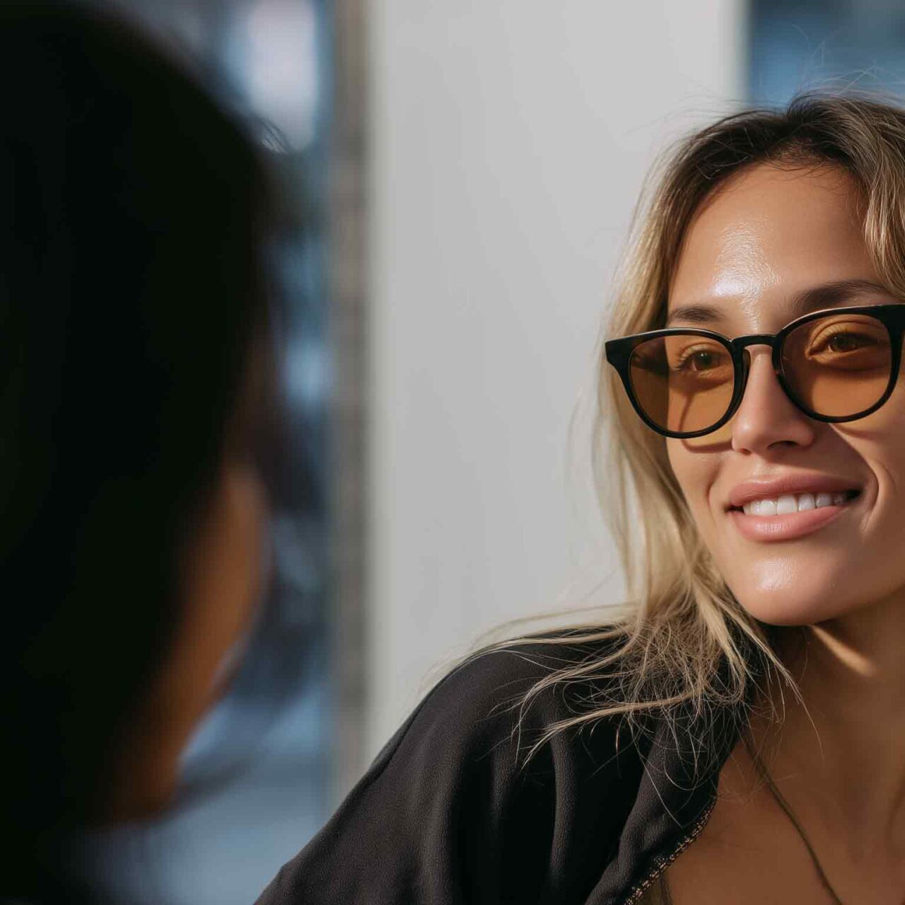 Woman-wearing-Avulux-glasses-at-her-eye-care-provider-office-banner